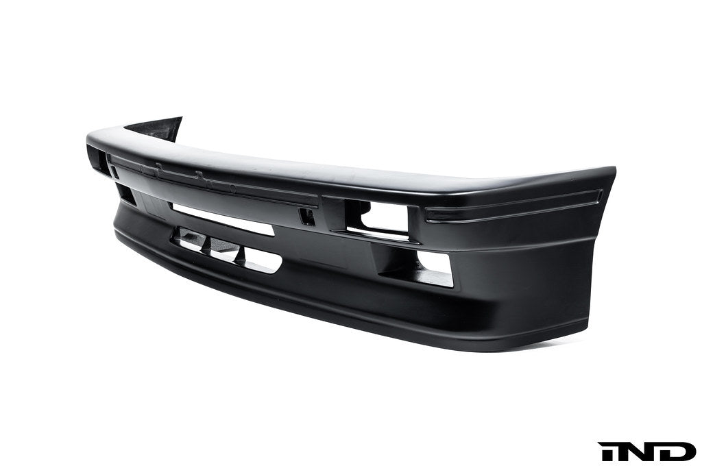 Alpha N E30 M3 DTM carbon front bumper cover for exterior, showcasing its lightweight design and sleek white finish.