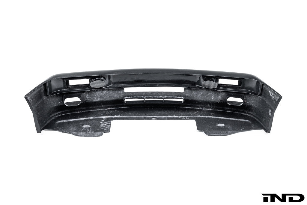 Alpha N E30 M3 DTM carbon front bumper cover for exterior use, shown on a white background.