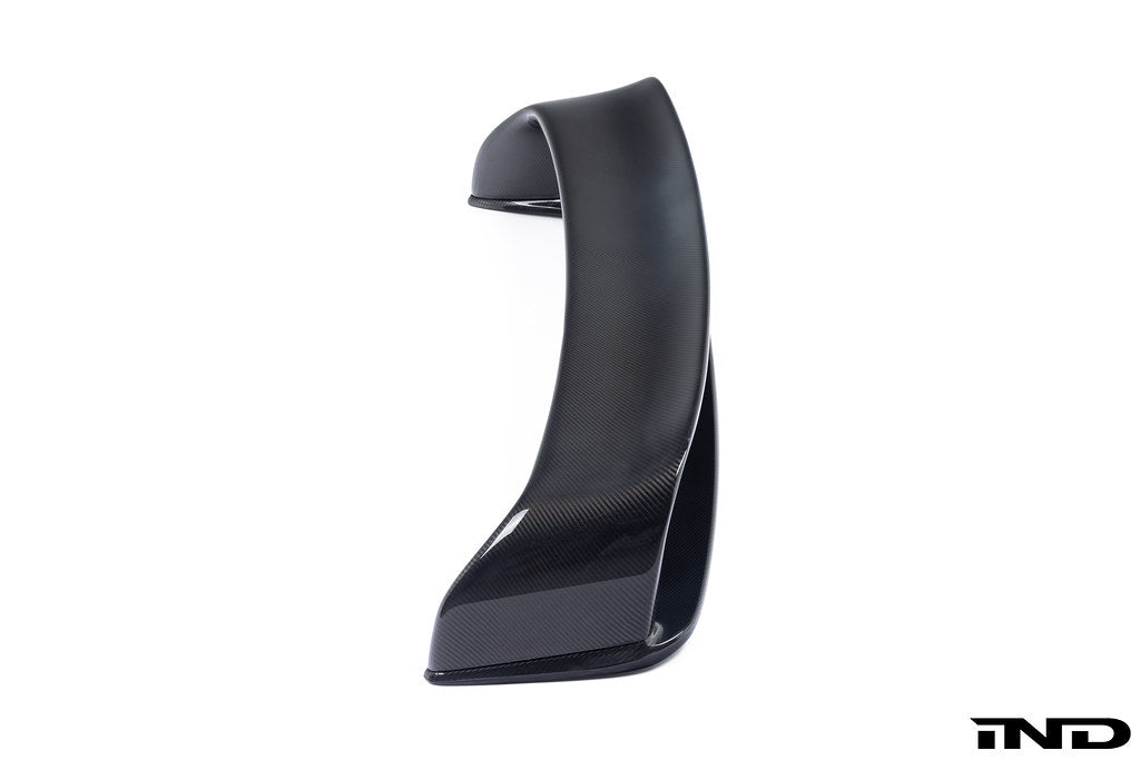 Alpha-N E36 M3 carbon fixed rear wing with aerodynamic design, mounted on the exterior of the vehicle for enhanced performance.