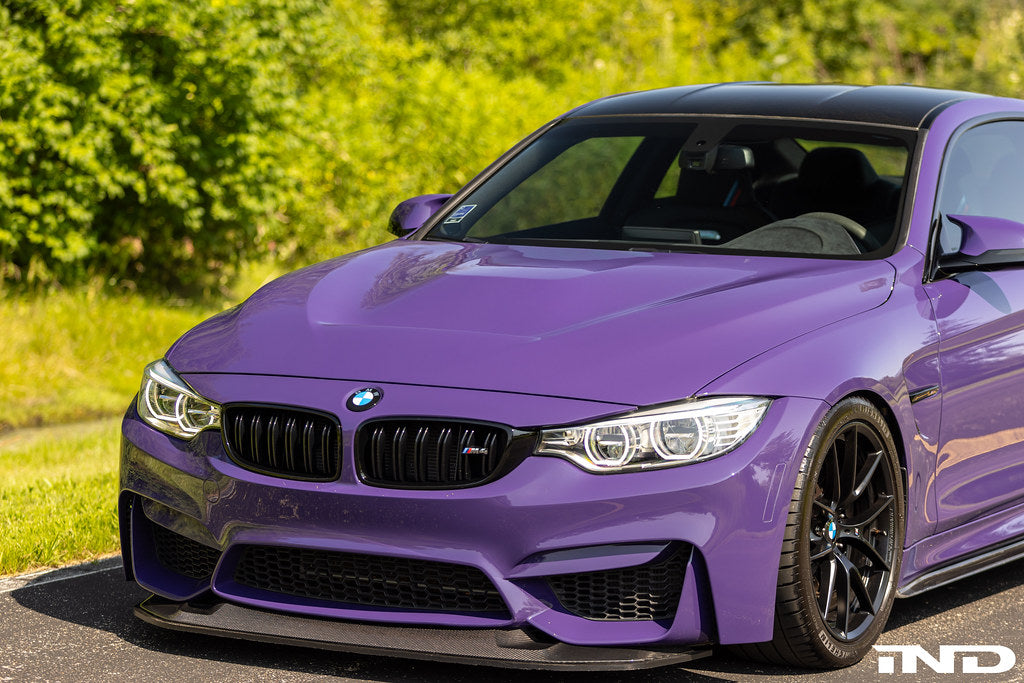 Alpha-N carbon GTS hood installed on BMW F82 M4 showing motorsport vented carbon fiber design