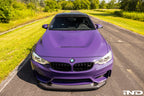 Alpha-N carbon GTS hood installed on BMW F82 M4 showing motorsport vented carbon fiber design