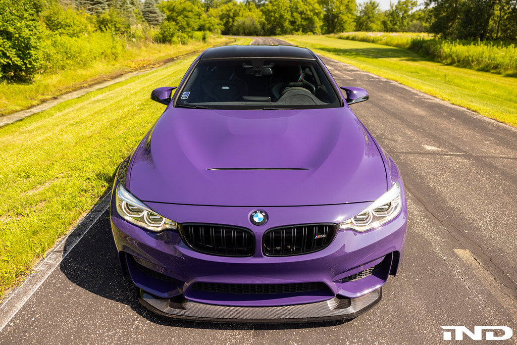 Alpha-N carbon GTS hood installed on BMW F82 M4 showing motorsport vented carbon fiber design