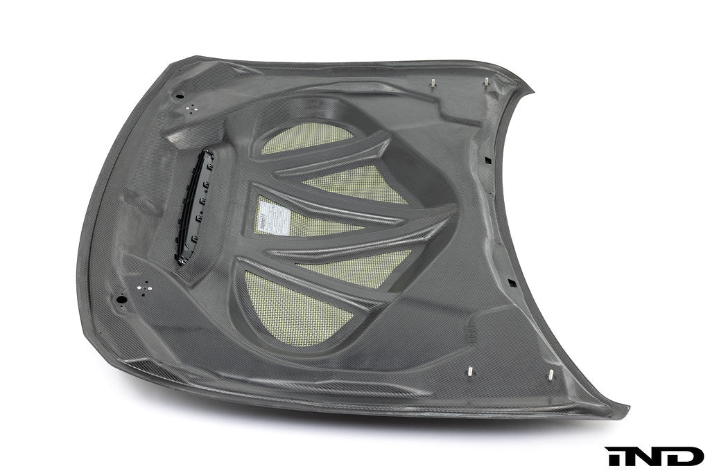 Alpha-N F82 M4 carbon GTS hood in raw carbon fiber on white background