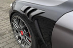 Alpha N carbon vented front fender set installed on a BMW M4 F82 exterior car part with sleek design and venting details.