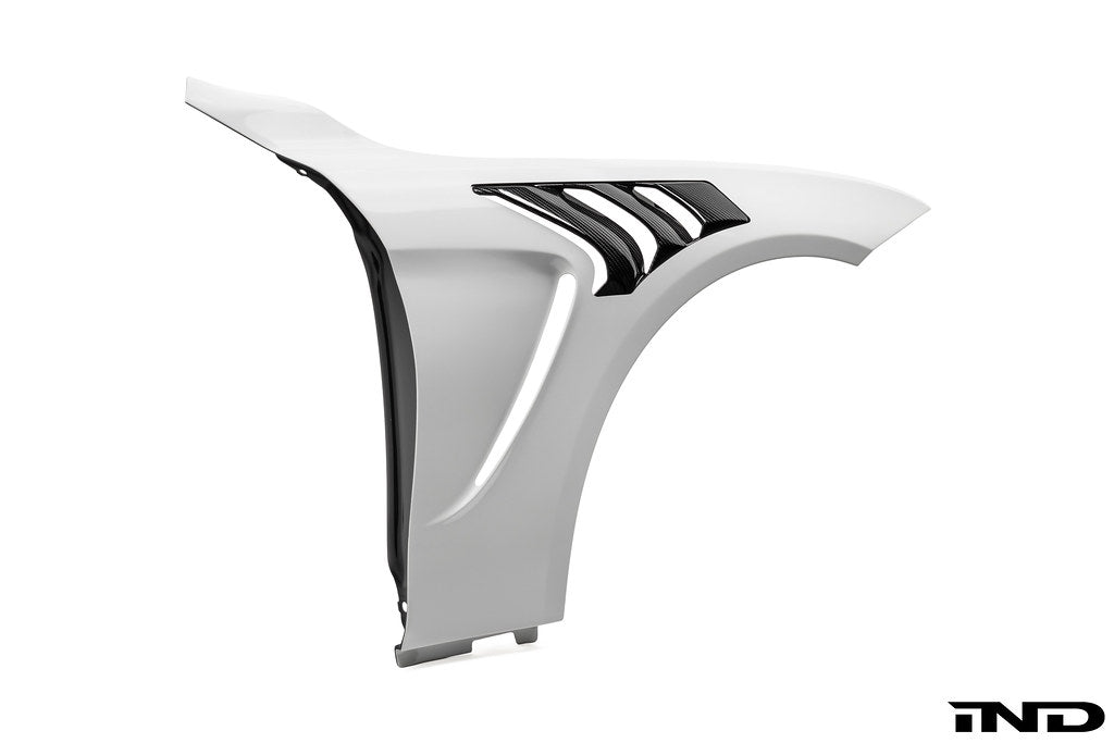 Alpha-N F82 M4 carbon vented front fender set on white background, showcasing lightweight, aerodynamic exterior car parts.