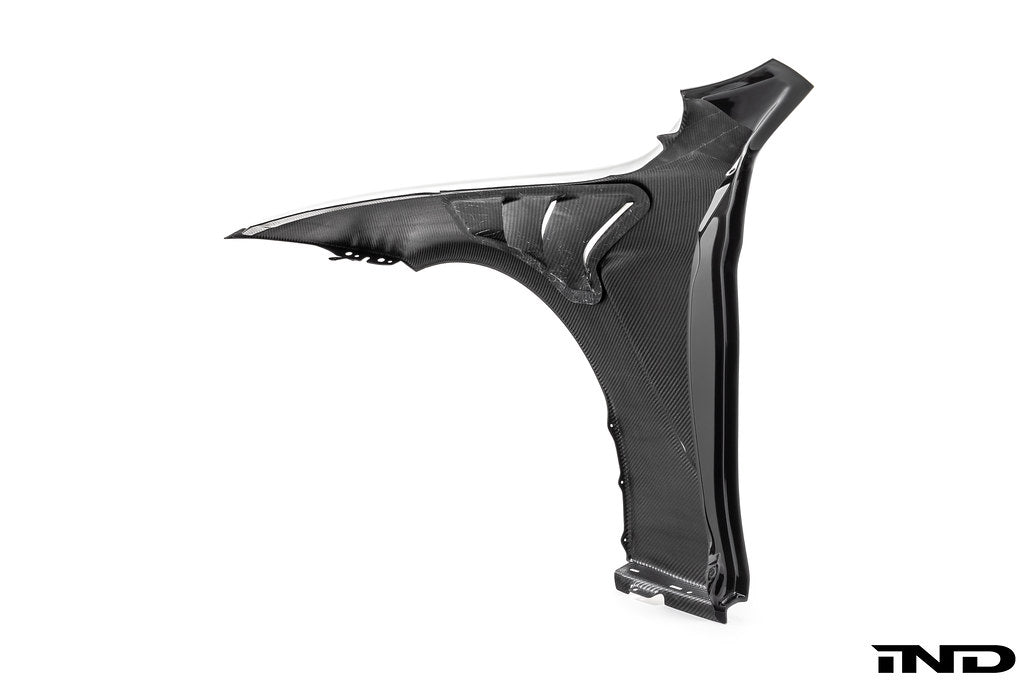 Alpha-N F82 M4 carbon vented front fender set mounted on a white background, showcasing lightweight, aerodynamic exterior car parts.