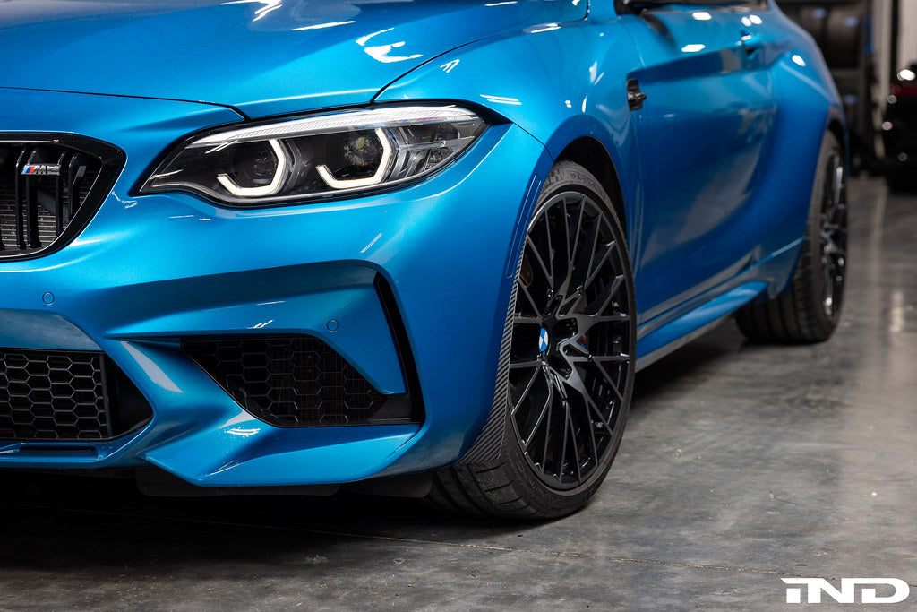 Alpha N F87 M2 Carbon Corse Aeroblades exterior car aeroblades installed on a vehicle, showcasing sleek carbon fiber design.