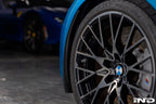 Alpha N F87 M2 Carbon Corse Aeroblades exterior car parts installed on a vehicle, showcasing sleek carbon fiber aerodynamic blades.