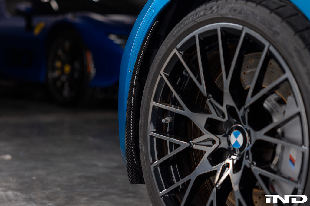 Alpha N F87 M2 Carbon Corse Aeroblades exterior car parts installed on a vehicle, showcasing sleek carbon fiber aerodynamic blades.