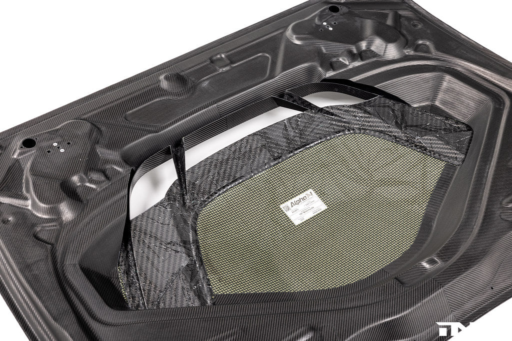 Alpha N F87 M2 Carbon Corse vented hood with sleek white finish, designed for exterior upgrade on BMW M2 vehicles.