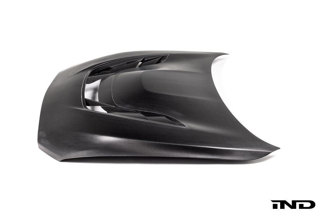 Alpha N F87 M2 Carbon Corse vented hood, white background, showing the lightweight, aerodynamic carbon exterior hood for BMW M2.