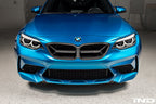 Alpha N F87 M2 Competition CS Carbon Corse front grille installed on exterior of the vehicle, showcasing its sleek carbon fiber design.