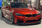 Alpha N F8X M3 M4 Carbon Corse Aeroblades installed on the exterior of the vehicle, showcasing sleek carbon fiber design.