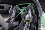 Interior view of the Alpha N G87 M2 bolt-in harness bar installed in a vehicle, providing safety support for racing harnesses.