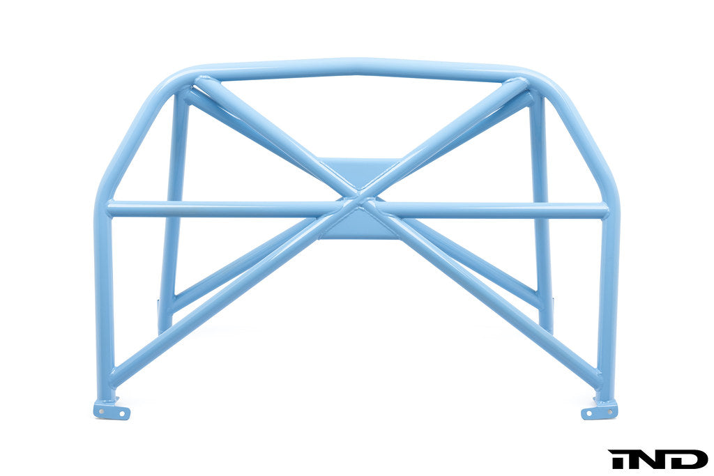 Alpha-N G87 M2 bolt-in harness bar installed in a car interior with a white background, showcasing its sturdy metal construction.