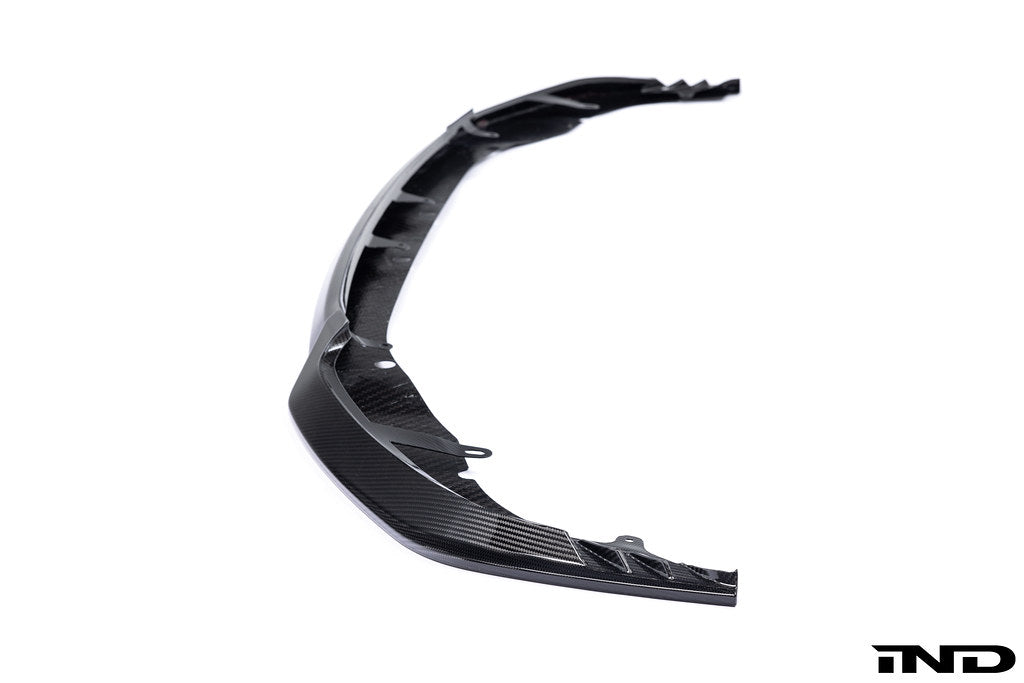 Alpha N G87 M2 Carbon Clubsport front lip exterior accessory installed on a white background.