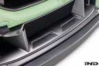 Alpha N G87 M2 carbon front center bumper trim installed on vehicle exterior, showcasing sleek, lightweight design.