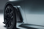 Alpha N G87 M2 carbon front fender set V2 with blades installed on vehicle, showcasing sleek exterior design and aerodynamic features.