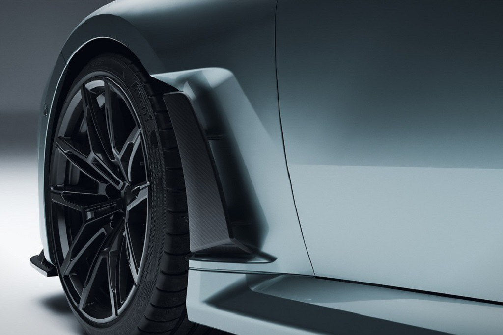 Alpha N G87 M2 carbon front fender set V2 with blades installed on vehicle, showcasing sleek exterior design and aerodynamic features.