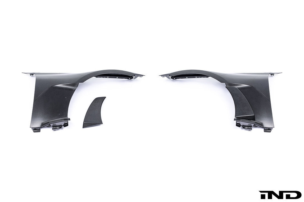 Alpha N G87 M2 carbon front fender set V2 with blades, exterior car part shown on white background.