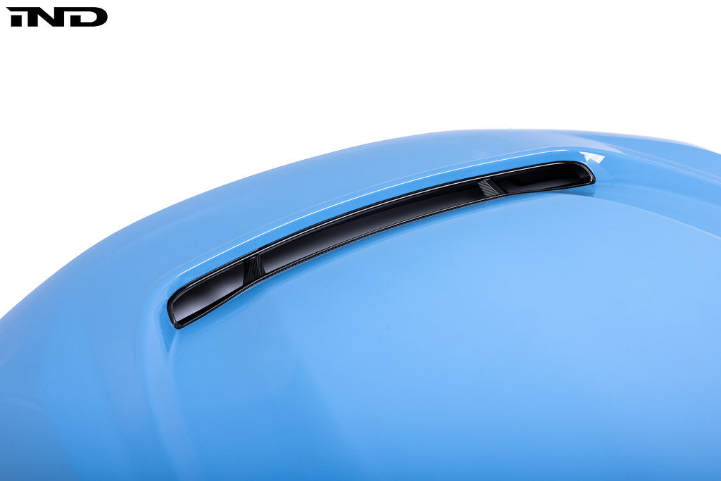 Alpha-N G87 M2 Carbon vented hood with front vent insert on a white background, showcasing lightweight exterior car modification.