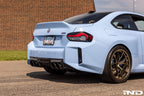 Alpha-N G87 M2 carbon rear diffuser installed on a BMW M2 G87, showcasing its sleek aerodynamic exterior design.