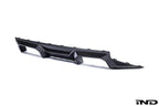 Alpha N G87 M2 carbon rear diffuser installed on a car, showcasing its sleek white finish and aerodynamic design.