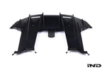Alpha N G87 M2 Carbon rear underbody floor kit installed on a white background, showcasing sleek aerodynamic exterior upgrade.