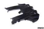 Alpha N G87 M2 carbon rear underbody floor kit installed on a car, shown against a white background, highlighting its sleek design.