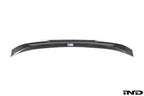 Alpha N G87 M2 carbon trunk spoiler mounted on a white background, showcasing the sleek exterior design and aerodynamic features.