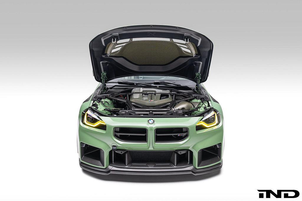 Alpha-N G87 M2 Carbon Vented Hood installed on car, showing sporty exterior design and vented hood features.