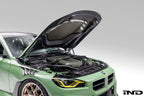 Alpha-N G87 M2 Carbon Vented Hood installed on a BMW M2 Clubsport, showing lightweight, vented exterior design for improved airflow.