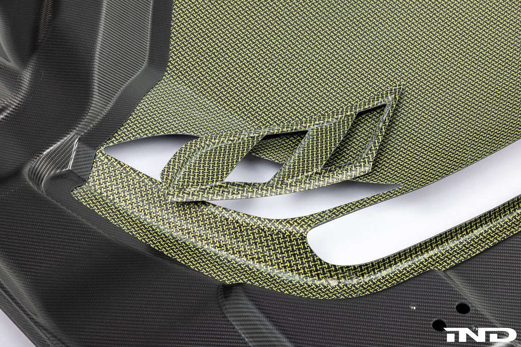 Alpha-N G87 M2 Carbon Vented Hood Clubsport installed on a BMW M2, showcasing lightweight carbon fiber and vented design.