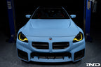 Alpha N G87 M2 carbon vented hood installed on a car, showcasing lightweight exterior design and venting features.