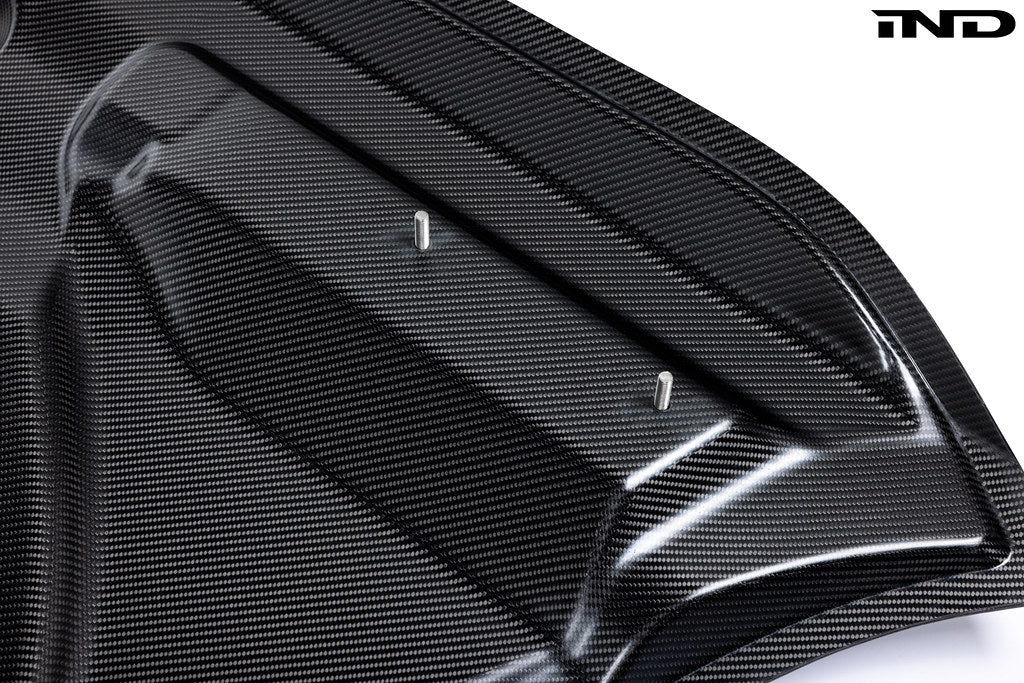 Alpha-N G87 M2 Carbon vented hood for exterior, shown in white background, highlighting lightweight carbon design and venting features.