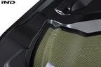 Alpha N G87 M2 carbon vented hood installed on a car, showcasing lightweight, aerodynamic exterior design with white background.