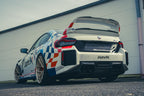 Alpha N G87 M2 Class 3 Wing Gurney Flap installed on a car exterior, highlighting its aerodynamic design and fitment.