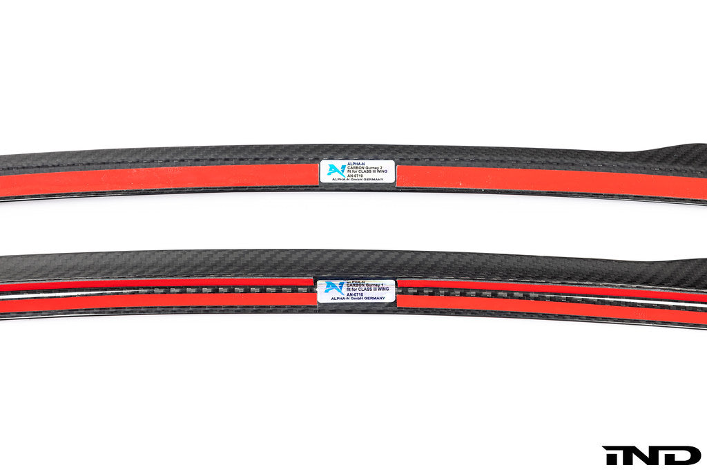 Alpha-N G87 M2 Class 3 wing gurney flap set for exterior automotive use, shown in white background with detailed design.
