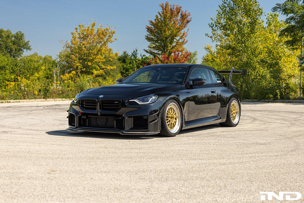 Alpha N G87 M2 GT3 Swan Neck Rear Wing installed on exterior of car, showcasing aerodynamic design and performance features.