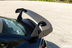 Alpha N G87 M2 GT3 exterior swan neck rear wing installed on a car, showcasing aerodynamic design and performance features.