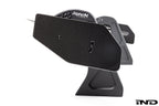 White Alpha N Corse Swan Neck Rear Wing mounted on a car, showcasing its aerodynamic design and sleek exterior finish.