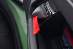 Alpha N G87 M2 Motorsport interior door pull kit installed, featuring sleek handles and ergonomic design for enhanced grip.