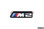 Alpha N G87 M2 front grille emblem retainer for Pre-LCI models, shown on white background. Exterior car part.