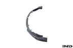 Alpha-N G8X M3 M4 carbon front spoiler mounted on white background, showcasing aerodynamic exterior car enhancement.