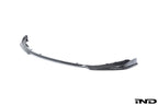 Alpha N G8X M3 M4 carbon front spoiler mounted on a white background, showcasing its aerodynamic design and lightweight carbon material.