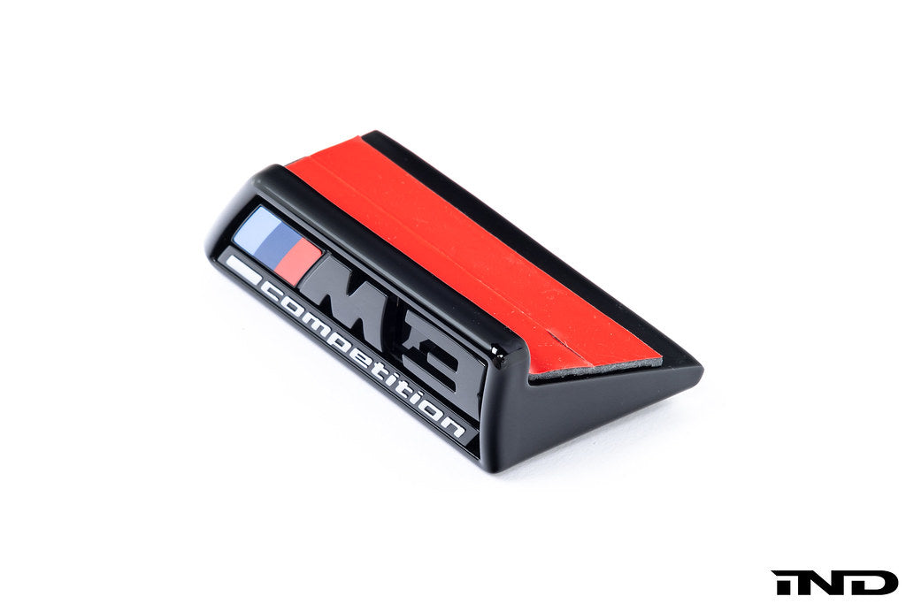 Alpha N G8X M3 M4 Competition front grille emblem retainer on white background, exterior car accessory for BMW models.