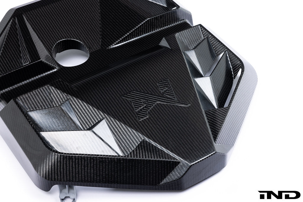 Alpha N G8X S58 carbon engine cover mounted on a white background, showcasing the sleek exterior design for M2, M3, and M4 models.