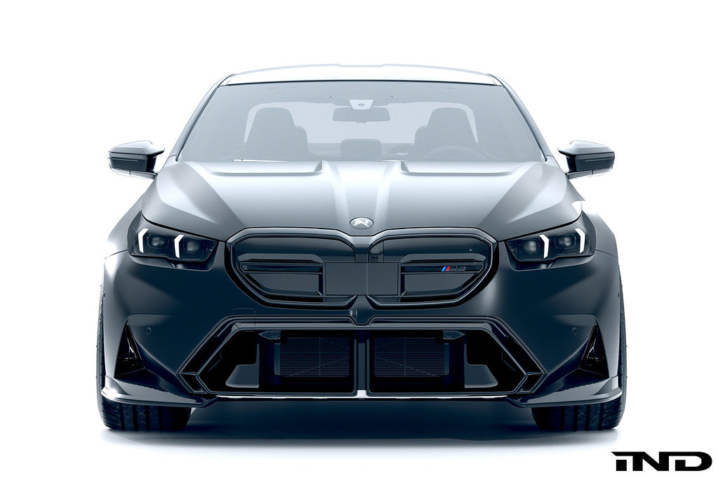 Alpha-N G90 G99 M5 carbon front corner splitter set installed on a vehicle's exterior, featuring two-piece aerodynamic design.