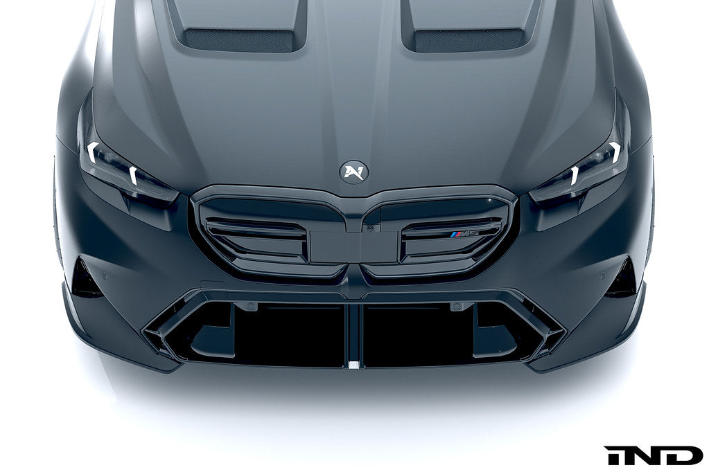 Alpha N G90 G99 M5 carbon front corner splitter set installed on a vehicle’s exterior, showcasing the sleek aerodynamic design.