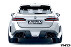 Alpha N G90 G99 M5 carbon rear diffuser installed on exterior of vehicle, showcasing sleek aerodynamic design.